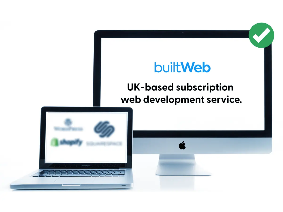 The BuiltWeb team working together at a desk with screens showing website designs